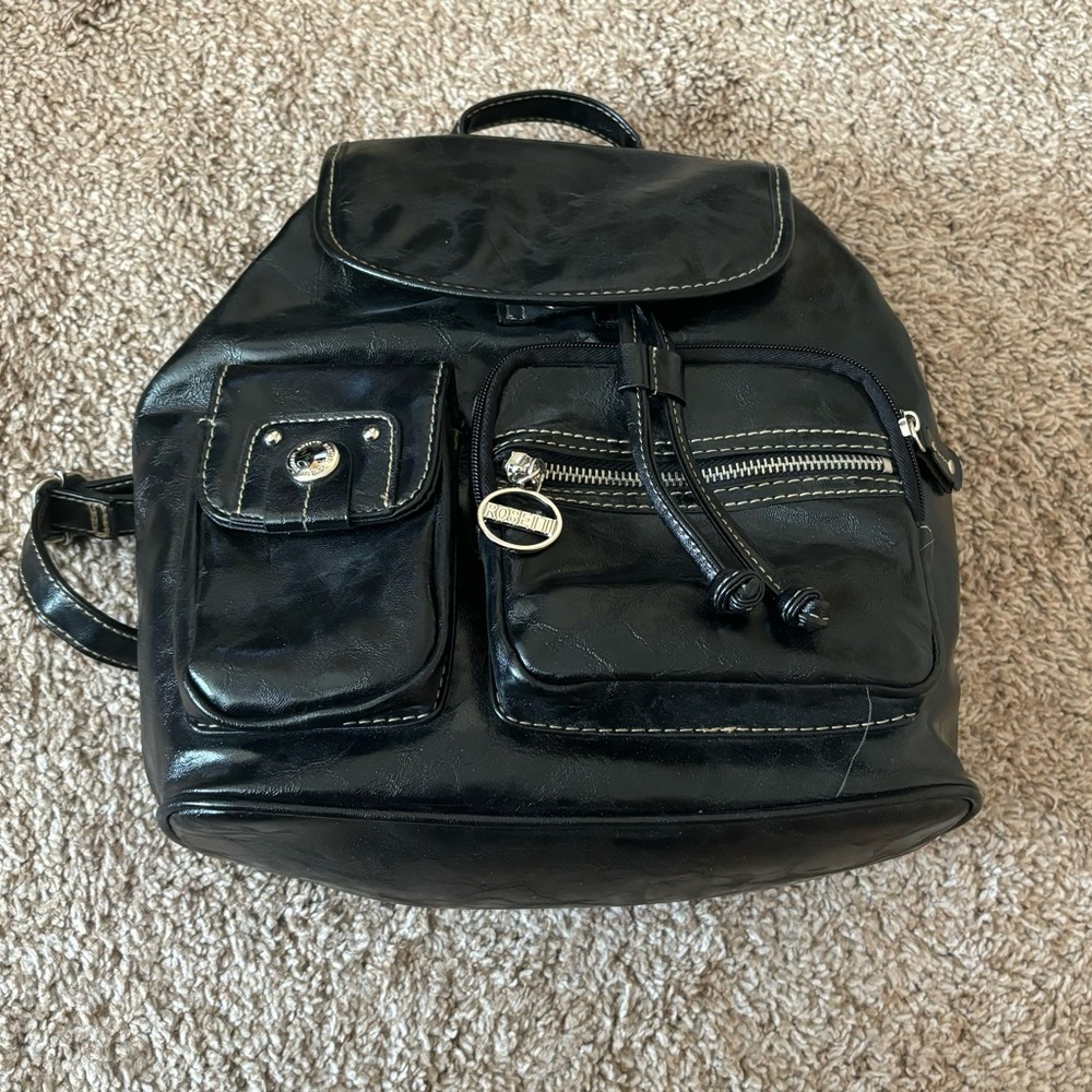 Rossetti Faux Leather backpack with snap closure